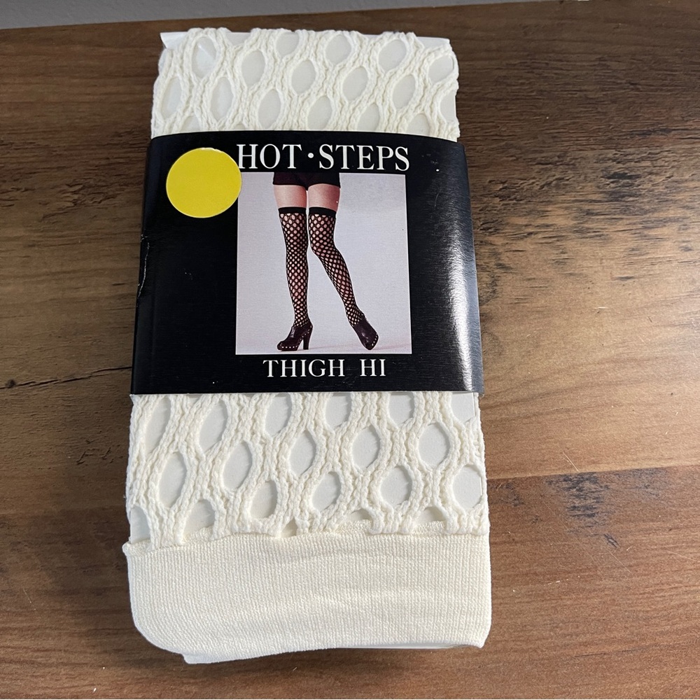 Hot step thigh hi. Ivory color. ONE SIZE FITS ALL 4'10-5'8" 95-160 LBS.